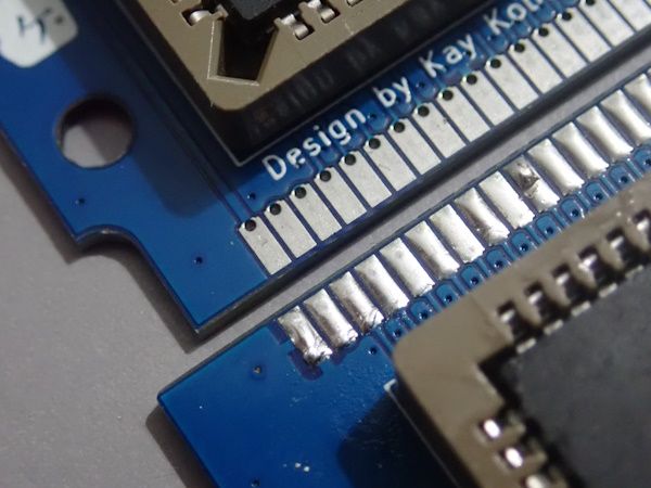 Solder blobs to thicken ROM.jpg