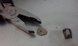 Tearing off plastic welded rivots.jpg